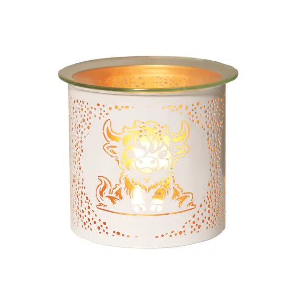 Decorative candle holder with a cow design on a white background