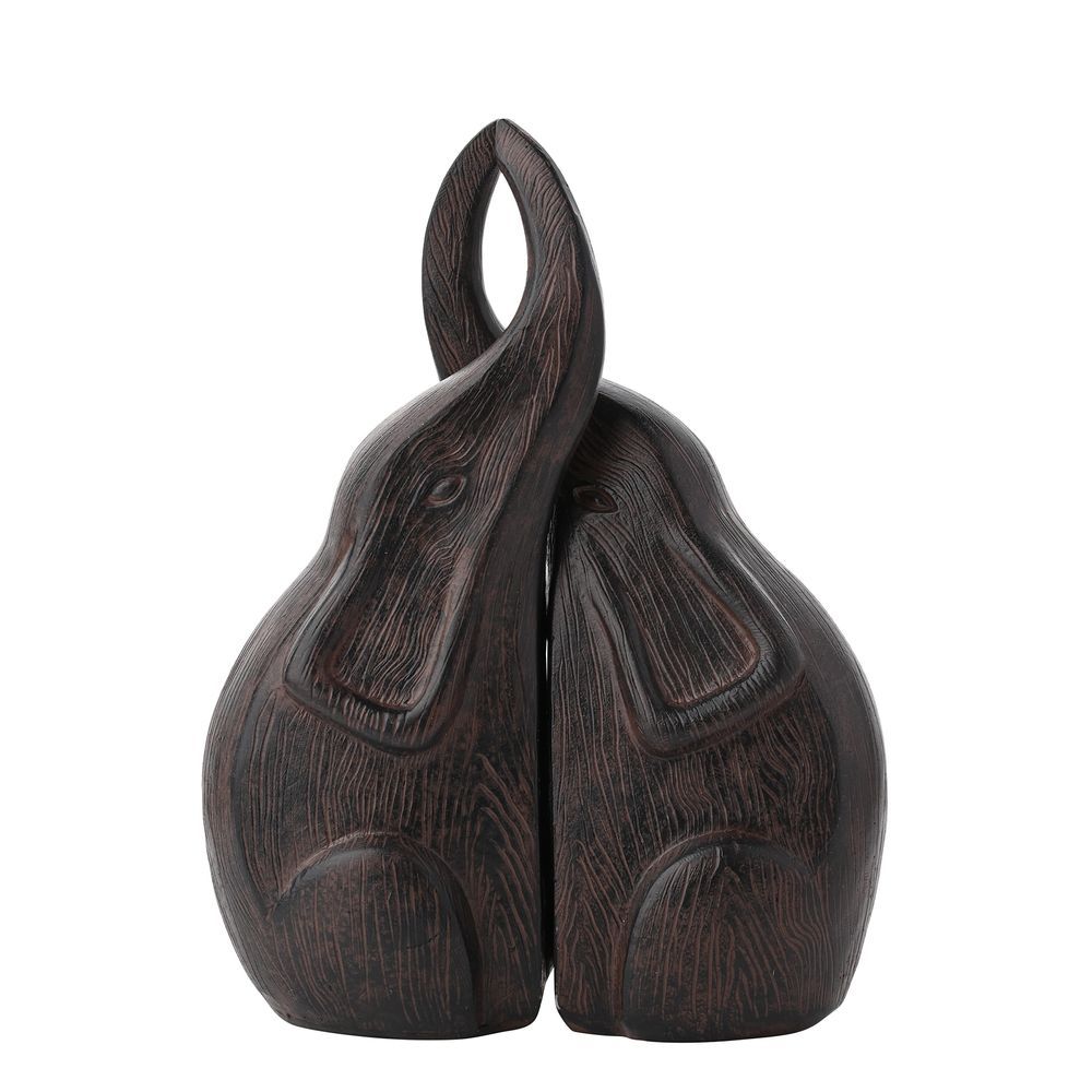 Dark Wood effect resin figurines of two elephants kissing on a white background