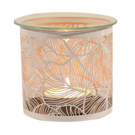White decorative wax warmer with botanical leaf pattern on a white background
