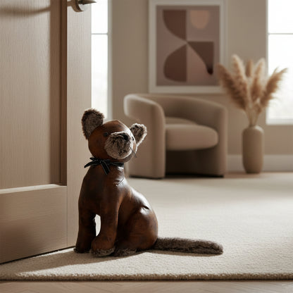 Brown faux leather cat doorstop with a bow 