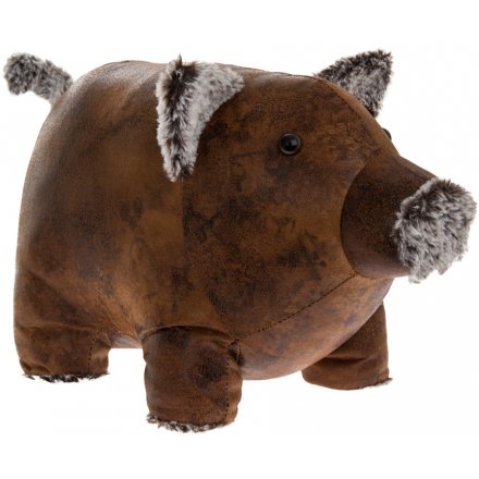 faux leather pig doorstop on a white background