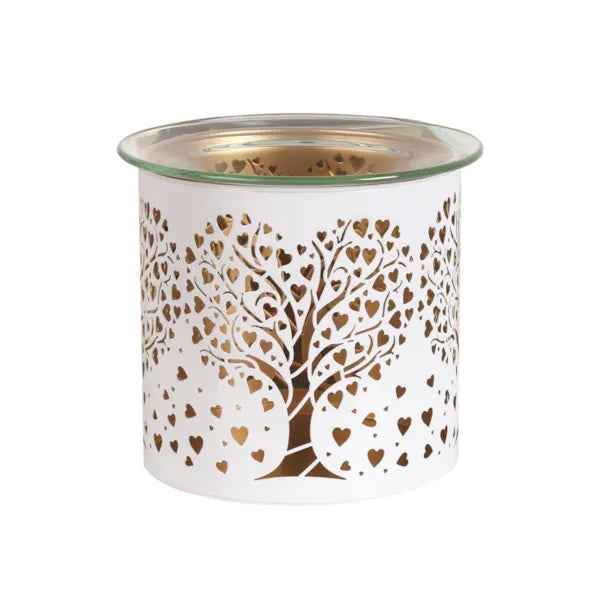 White wax warmer with heart tree design unlit on a white background