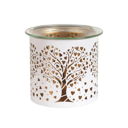 White wax warmer with heart tree design unlit on a white background