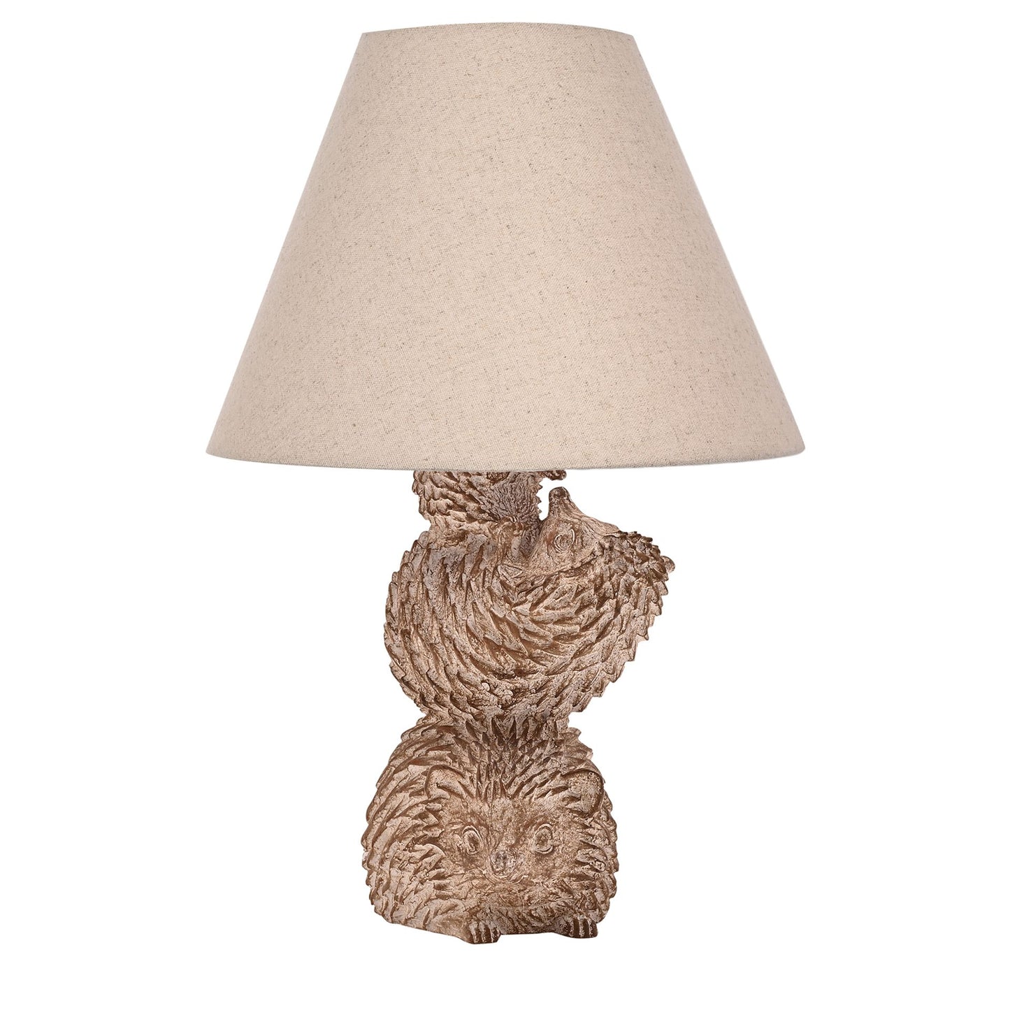 Decorative table lamp with hedgehog base and beige lampshade on a white background