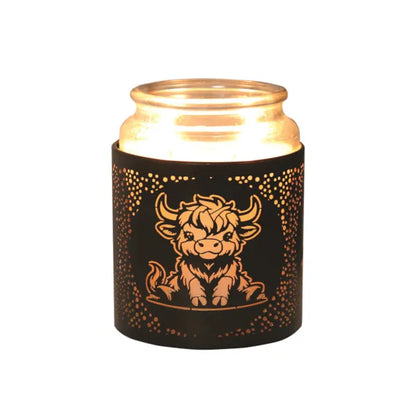 Jar with a decorative black sleeve featuring a highland cow design on a white background