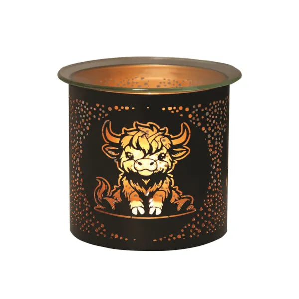 Candle warmer with a highland cow design on a white background