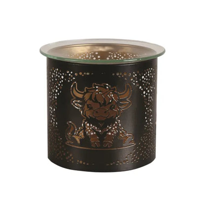 Decorative candle holder with a bull design on a white background
