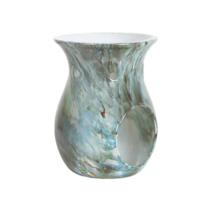 Marbled wax melt burner in jade green and blue tones on a white background