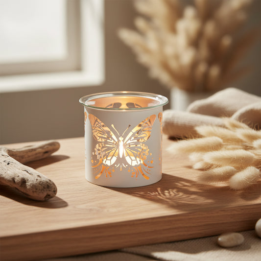 Butterfly-patterned wax Melt Burner with a lit candle inside