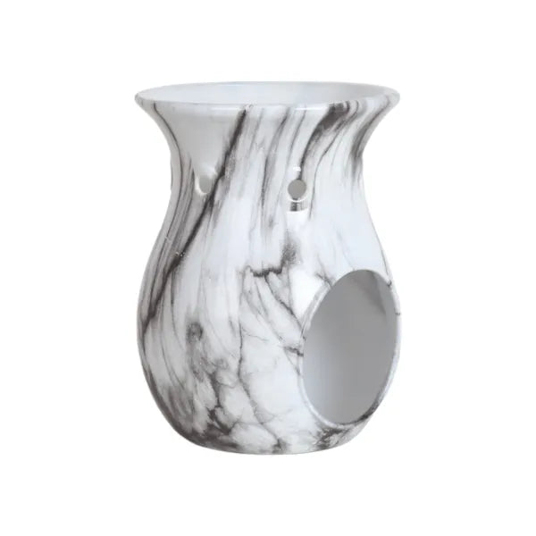 Marble-patterned wax warmer on a white background