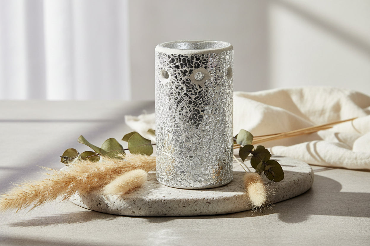 Decorative silver crackle wax melt burner with on a white background