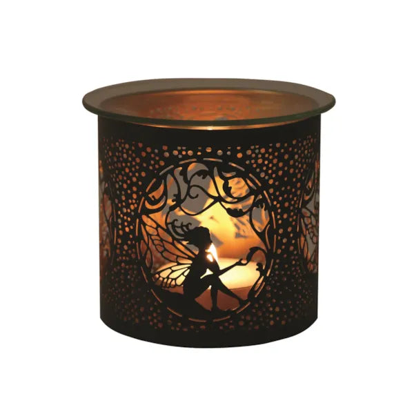 Decorative candle holder with fairy design on a white background