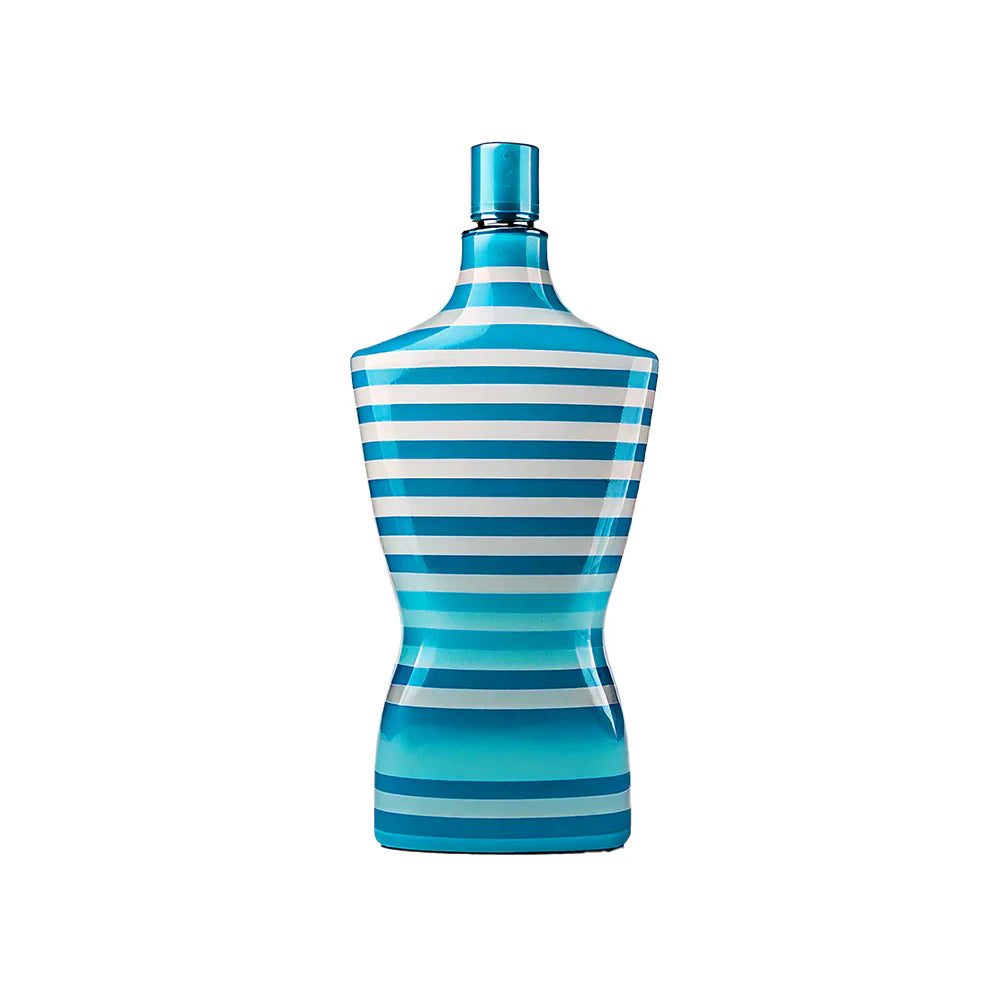 Blue and white striped perfume bottle on a white background