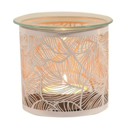White decorative wax warmer with botanical leaf pattern on a white background