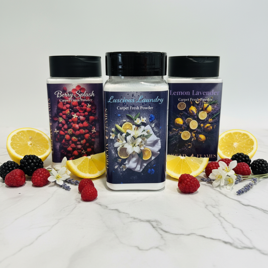 Carpet Fresh Powder shaker jars styled on white marble with fresh botanicals
